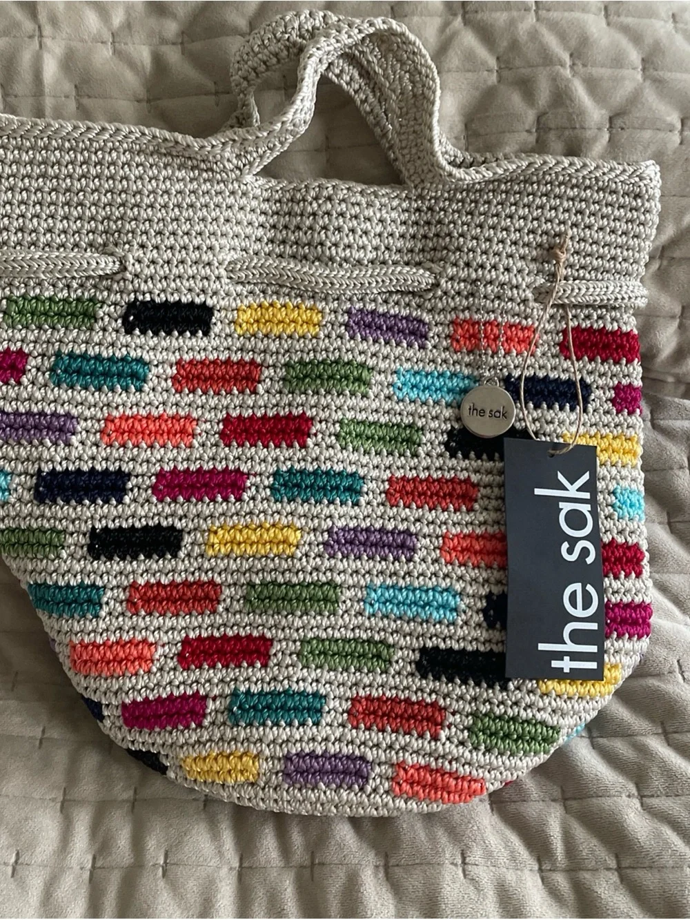The Sak cream crochet